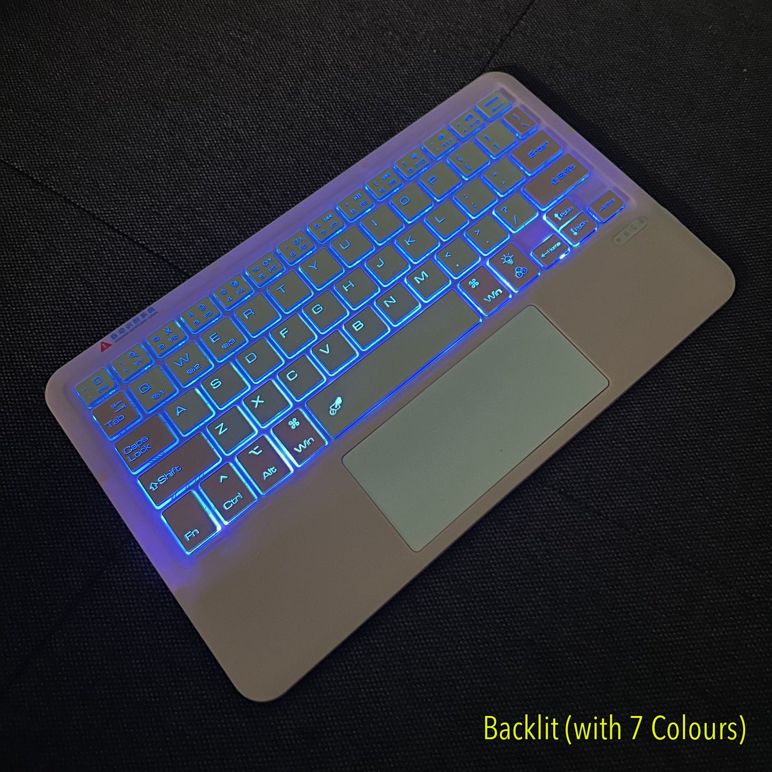 Ultra Thin Backlit Bluetooth Keyboard with TouchPad (Pairing 3 Devices) Pink