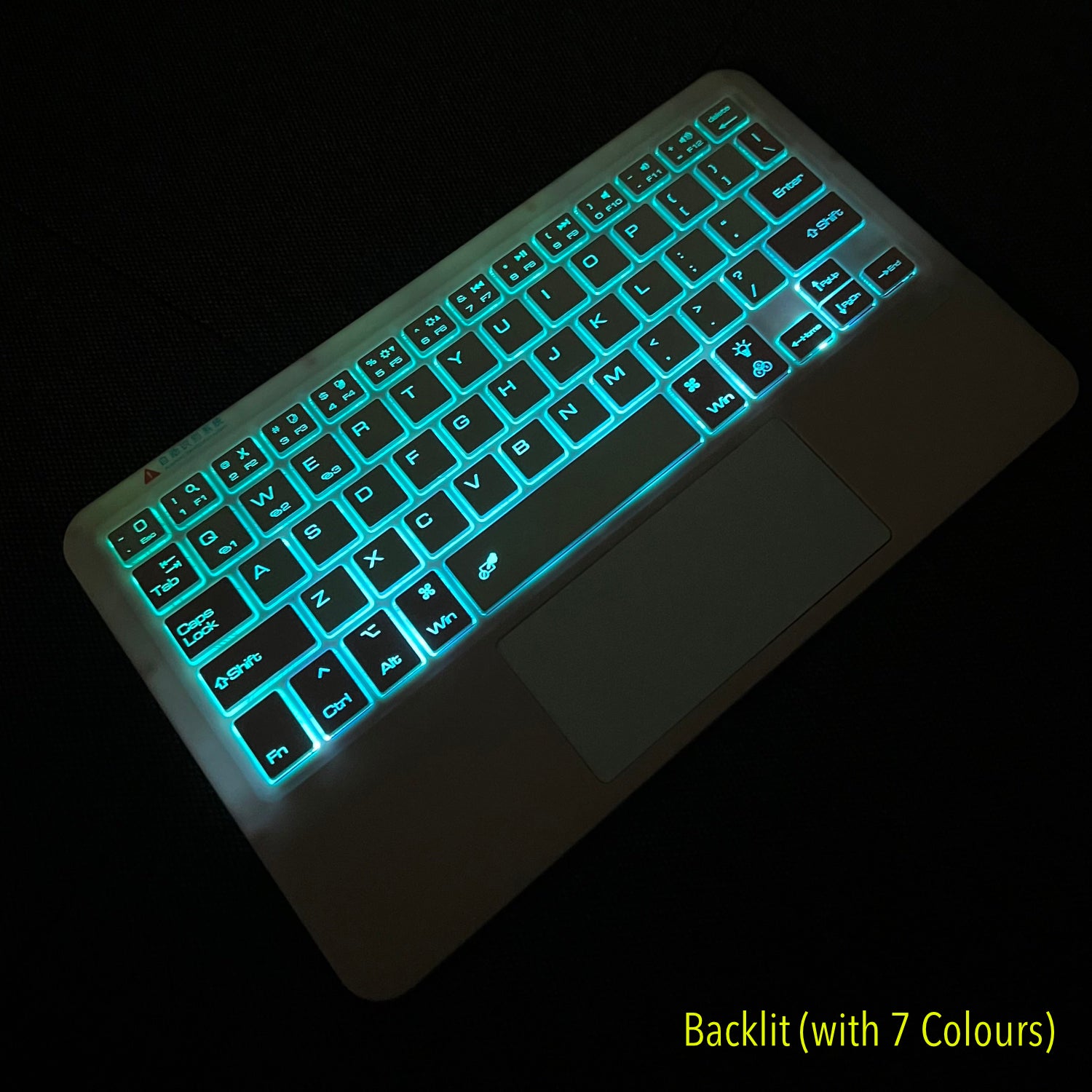Ultra Thin Backlit Bluetooth Keyboard with TouchPad (Pairing 3 Devices) Pink